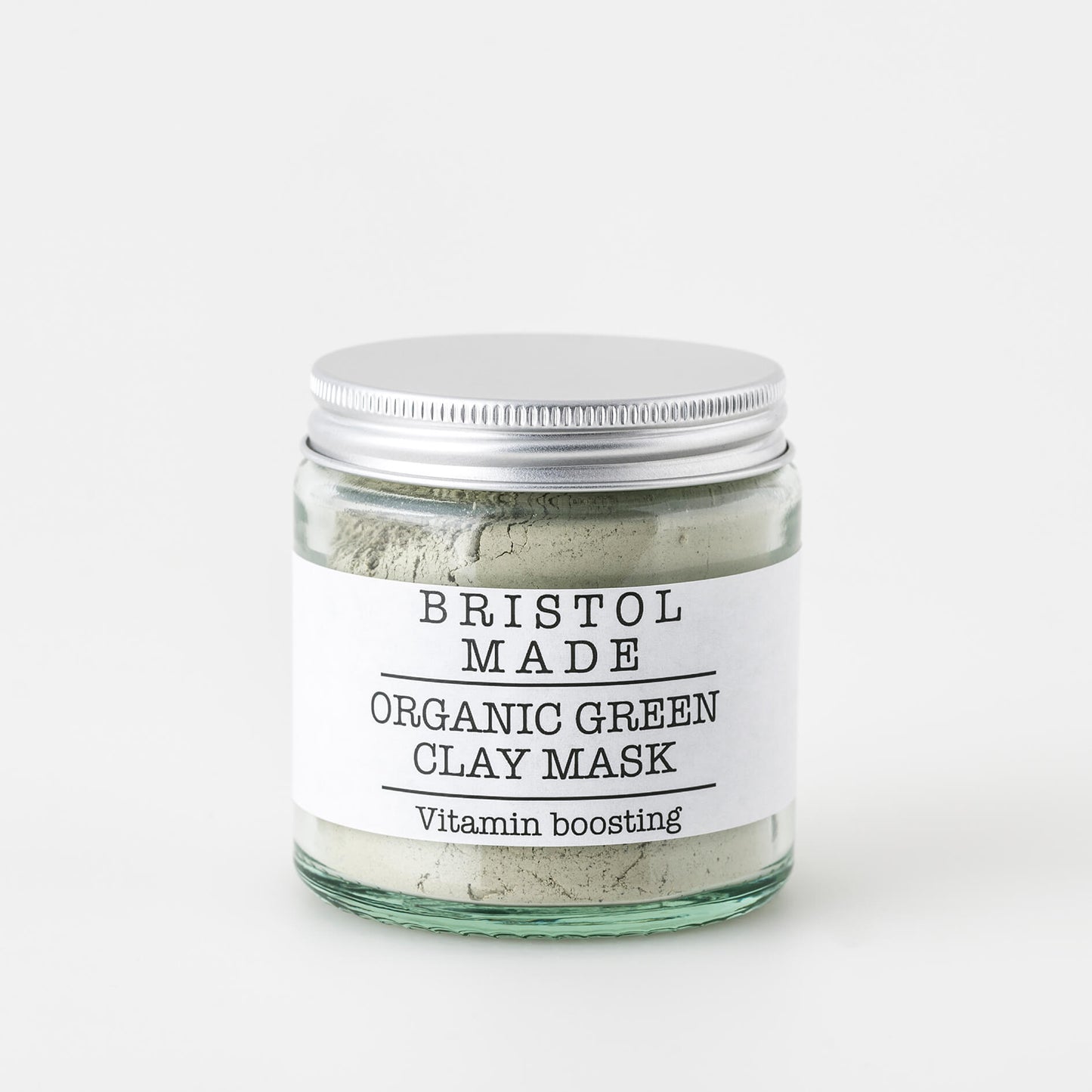 A 120ml jar of Bristolmade Green Clay Mask, featuring a white label with black text, fine green clay, for deep cleansing and detoxifying of the skin.