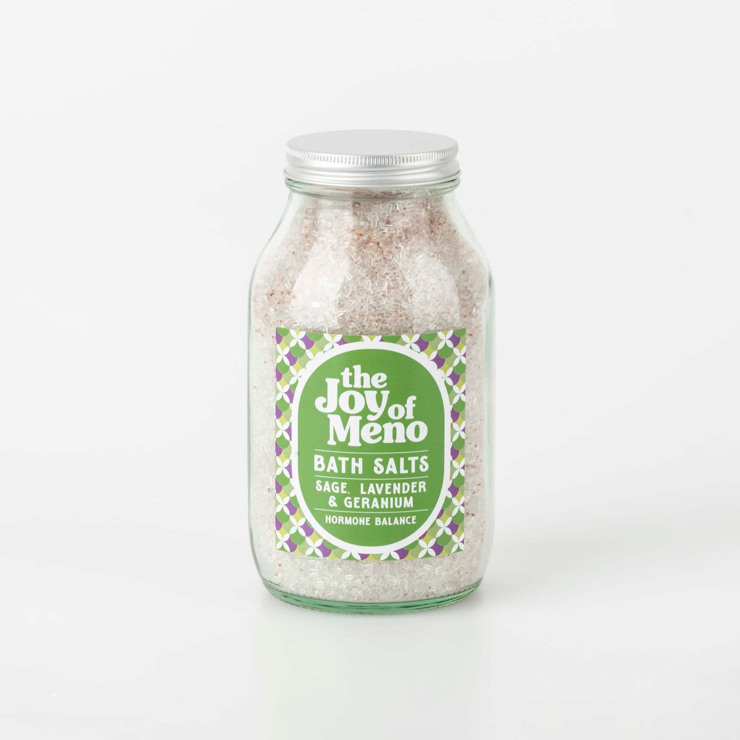 Sage, lavender and geranium bath salts. Pe pink from the blend of Epsom and Himalayan salts. In a 500ml clear glass jar with a green and purple label with white text.